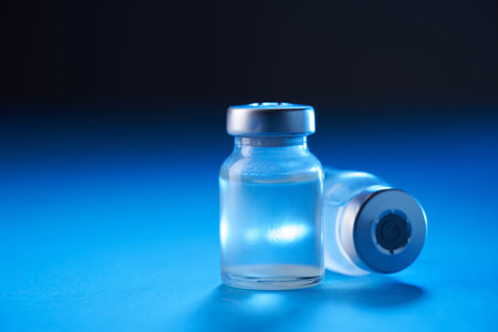 vaccine bottle on the blue background
