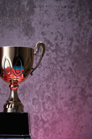 Champion golden trophy on gray backgroundの写真素材