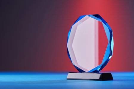 close up of crystal trophy on colored backgroundの写真素材