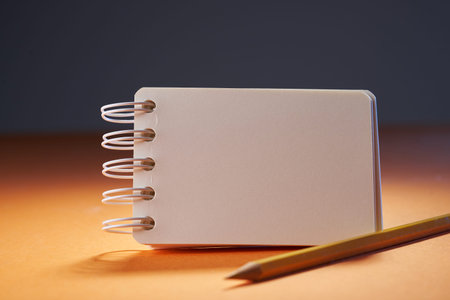blank note pad with pen for copy space