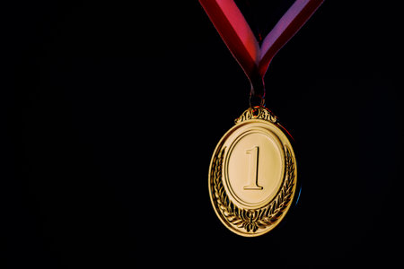 gold medal on the colored backgroundの写真素材