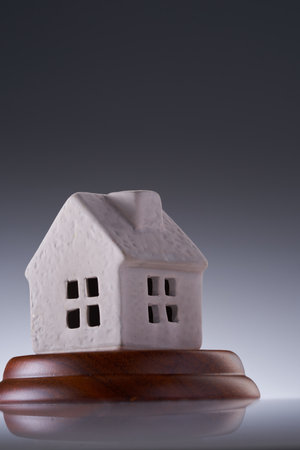 Gavel wooden and house for home buying or selling of bidding or lawyer of home real estate and building concept.の写真素材