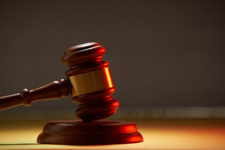 close up of gavel hammer on gray backgroun,law conceptの写真素材