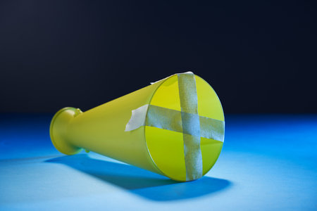 megaphone with crossed tape - free to speakの写真素材