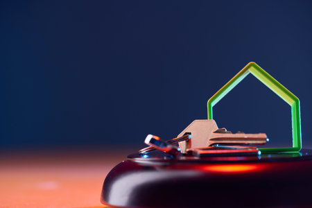 Wooden judge hammer and house modelの写真素材