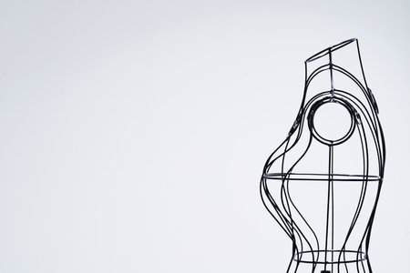 Stylish wire tailor's mannequin isolated on whiteの写真素材