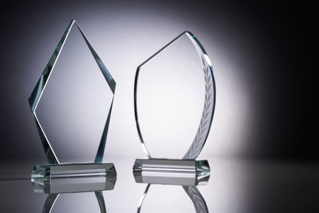 Crystal or glass trophy against gray backgroundの写真素材