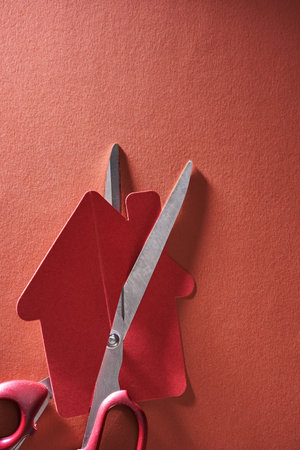 red paper model house cut in halfの写真素材