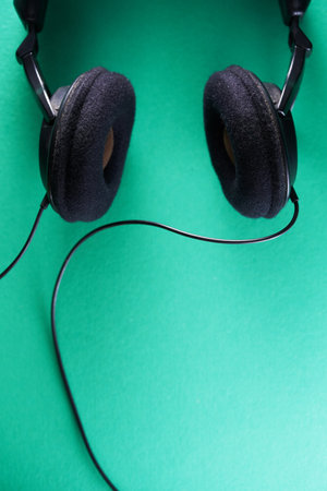 top view of head phone against green background - close upの写真素材