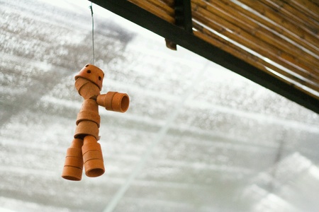 Pot doll hang on the wall.の素材