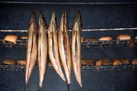 Tasty and succulent smoked fish made at the moment in the restaurant to taste
