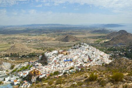 Wide panoramic view of the bird of Mojacar, Spain and its surroundings with the Mediterranean sea in the backgroundの写真素材