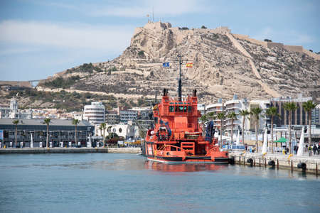 Alicante, Spain  03/29/2019 Open doors days carried out by the Port Authority .Panoramic view of the city of Alicante with its port in the foreground, ships and the Castle fortress of Sta. Barbaraのeditorial素材