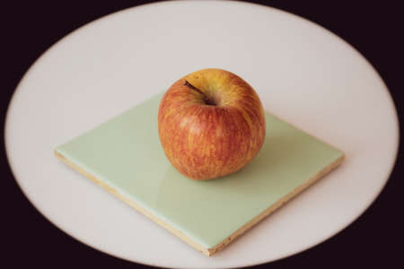 Apple, healthy and dietary fruit displayed on a kitchen tableの写真素材