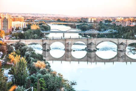 View of the river Ebro, the largest in Spain as it passes through Zarqagoza, capital of the kingdom of Aragonの写真素材