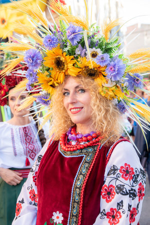 June 23, 2022. Alicante, Spain. Ukrainian citizens participating in the celebration of the LXV International Folklore Parade Traditional party in the holidays Bonfires in honor ofのeditorial素材