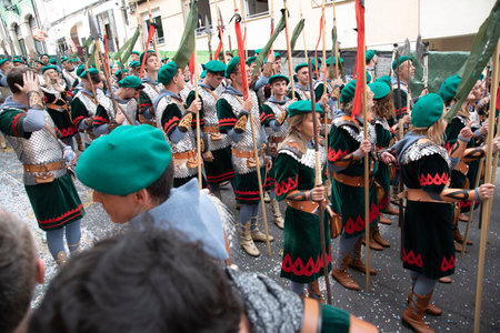 April 22, 2023 Alcoy, Alicante, Spain Staging of Christian troops and their entourage entering the...