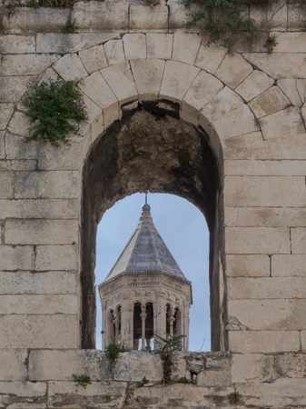 World heritage Diocletian's palace at Split, Croatia. View through an arch of the town wall to the catherdal of St. Domniusのeditorial素材