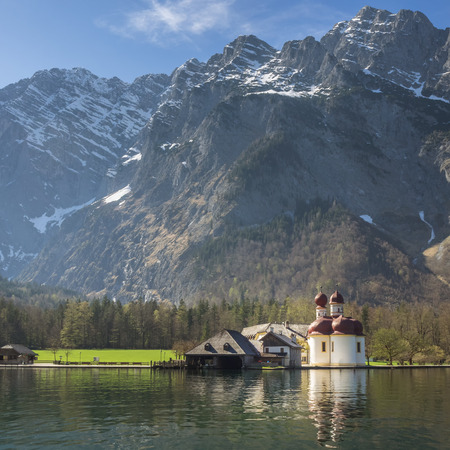 Lake Koenigssee and pilgrimage church Saint Bartholomae, Bavarian Alps, Bavaria, Germanyの写真素材