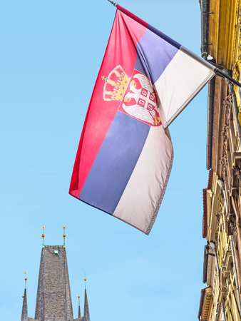 Czech flag and old bridge tower in Pragueの写真素材