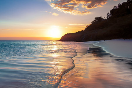 Sunset on the beach of the island of Crete, Greeceの素材