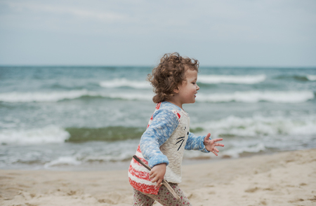 Summer vacation with children at the sea. Outdoor playの写真素材