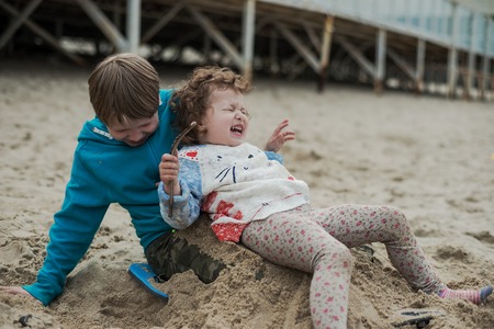 Summer vacation with children at the sea. Outdoor playの写真素材