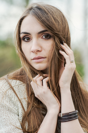 Beautiful young brunette woman with long hairの写真素材
