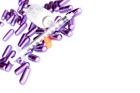 medical syringe and drug bottles on white backgroundの写真素材
