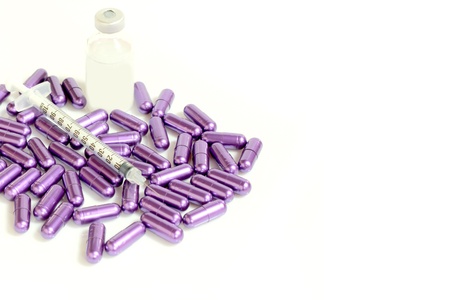 medical syringe and drug bottles on white backgroundの写真素材