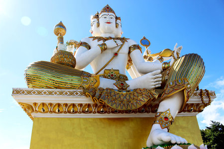 Big white color of Molding Brahma on Blue Sky Background in Thai Temple from Thailandの写真素材