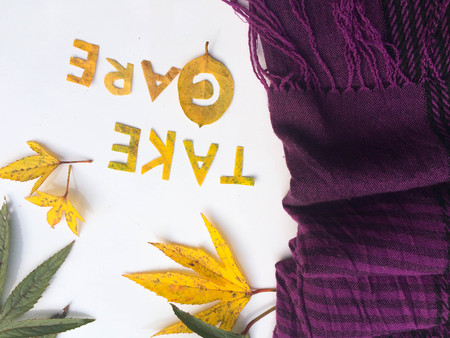 take care text make from leavesの写真素材