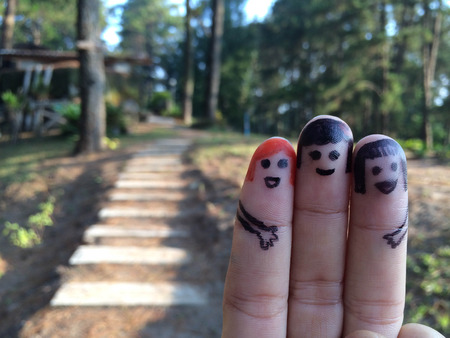 finger friend smileys with travel symbolの写真素材