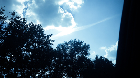 sun rising from the cloudsの写真素材