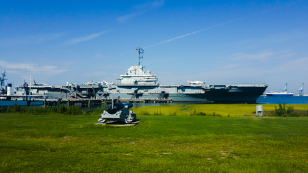 military ship with aircraft on itの写真素材