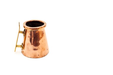 Old copper mug, isolated on white background with clipping pathの写真素材