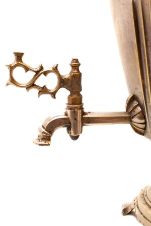 Vintage metal copper tea samovar on white background. Samovar side view. retro soot grunge tea samovar was used for a long time. Burned with firewoodの写真素材