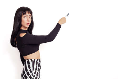 back view of writing beautiful woman. backside view of person. Isolated over white background.の写真素材