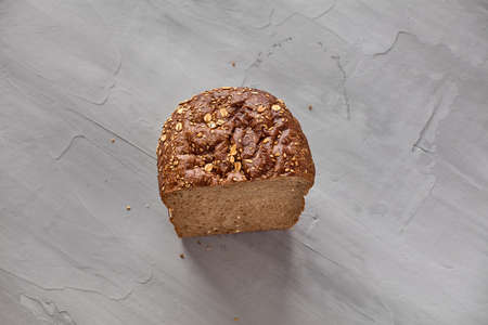 Loaf of bread. Grey background, copy space