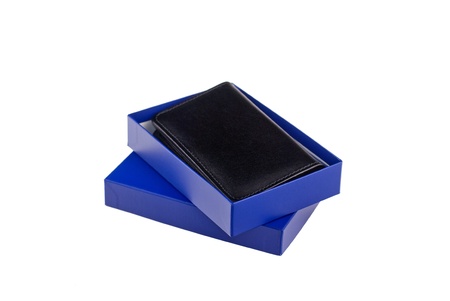 A photograph of a business card holder against a white background