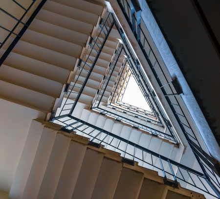 Staircase in triangular shape from below to infinity.