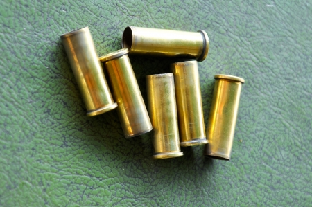 a casing containing a charge and a bullet or shot for small arms or an explosive charge for blasting.の写真素材