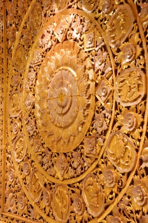Wall wood carved golden lotus bloom  Used to decorate the hall の写真素材