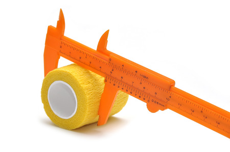 Orange vernier caliper isolatedの写真素材