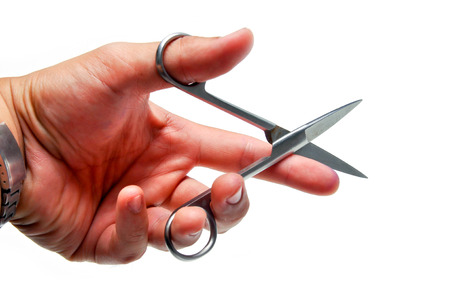 Metzenbaum scissors in hand isolated on white backgroundの写真素材