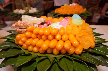 Thai Desserts called Med Kanun (Mung Bean Yolk) is Mung bean paste formed in egg yolk and sugar which is also popular snacks to accompany ceremonies.の写真素材