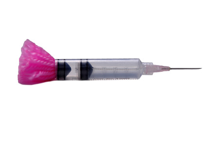 tranquilizer dart isolated on white の写真素材