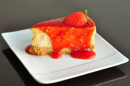Strawberry cheesecake with fresh strawberry in tea timesの写真素材