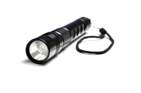 Aluminum LED flashlight isolated on white background.の写真素材