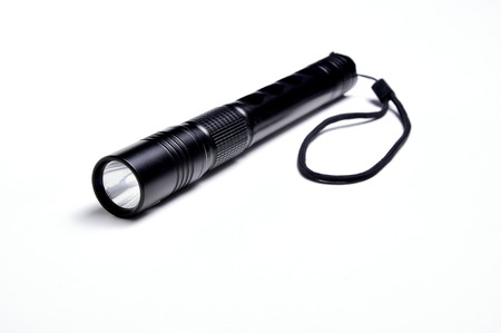 Aluminum LED flashlight isolated on white background.の写真素材